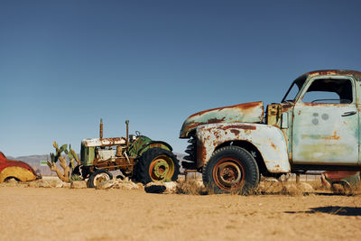 Abandoned vehicle against clear sky