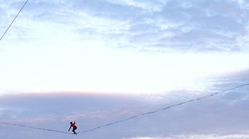 Low angle view of man against sky