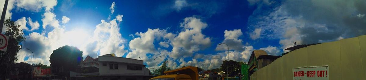 Low angle view of built structure against cloudy sky