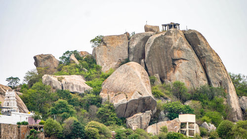 Scenic view of cliff against clear sky