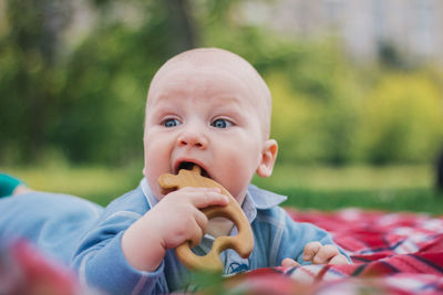 Portrait of cute boy eating food