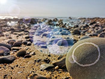 Close-up of stones on beach