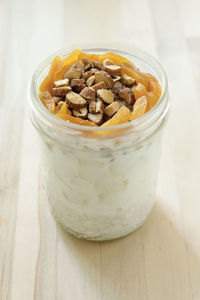 Close-up of ice cream in jar on table