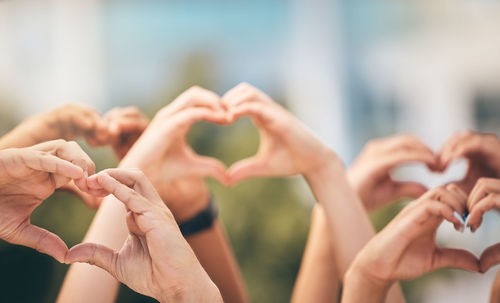 Cropped hand of woman holding hands