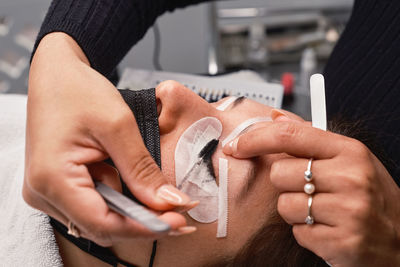 Close-up of woman holding hands