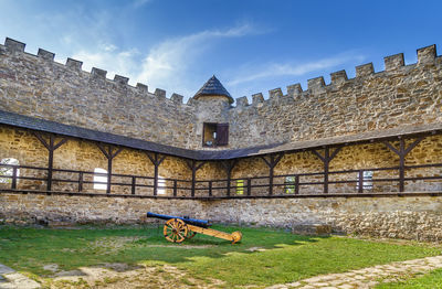 View of old building in field