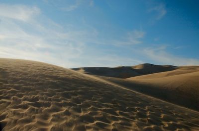 Idyllic shot of sand dunes in desert