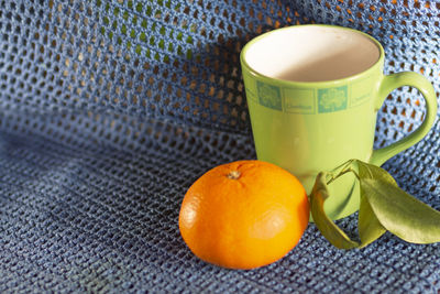 High angle view of orange juice on table