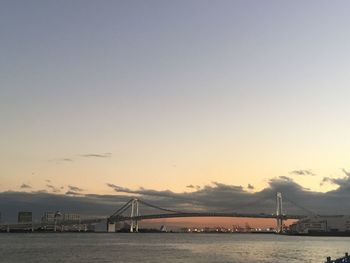 View of suspension bridge over sea