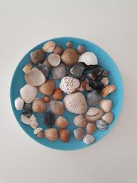 High angle view of candies in bowl on table