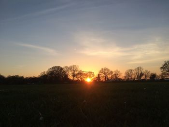 Scenic view of landscape at sunset