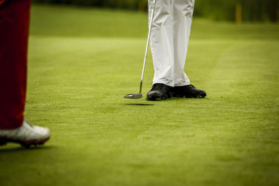 Low section of people playing on golf course