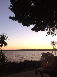 Scenic view of sea against sky at sunset