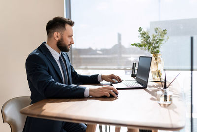 Businessman working at desk in office