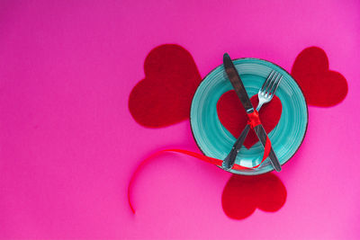 Close-up of stuffed toy against pink background