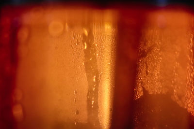 Close-up of wet glass window