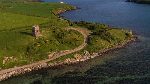 High angle view of landscape by sea