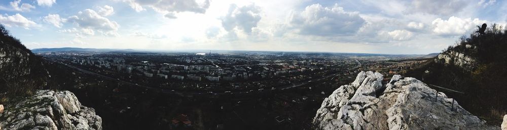 Panoramic view of cityscape against sky