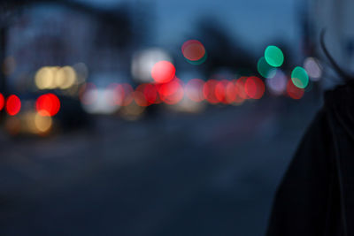 Defocused lights on road at night