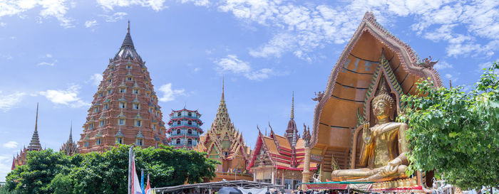 Low angle view of temple against building