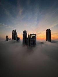 Low angle view of building against sky during sunset