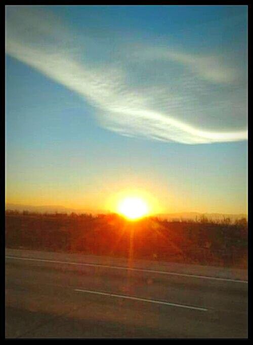 SCENIC VIEW OF LANDSCAPE AGAINST SKY DURING SUNRISE