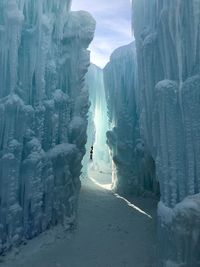 Walkway amidst icebergs during winter