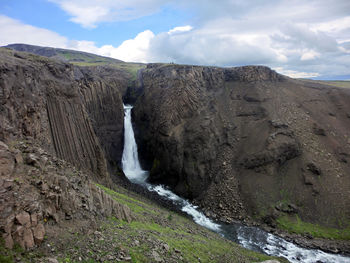 Waterfall against sky