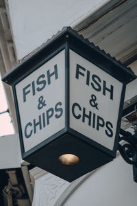 Close up of fish and chip sign outside a restaurant in london, uk, selective focus.