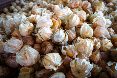 Full frame shot of onions in market