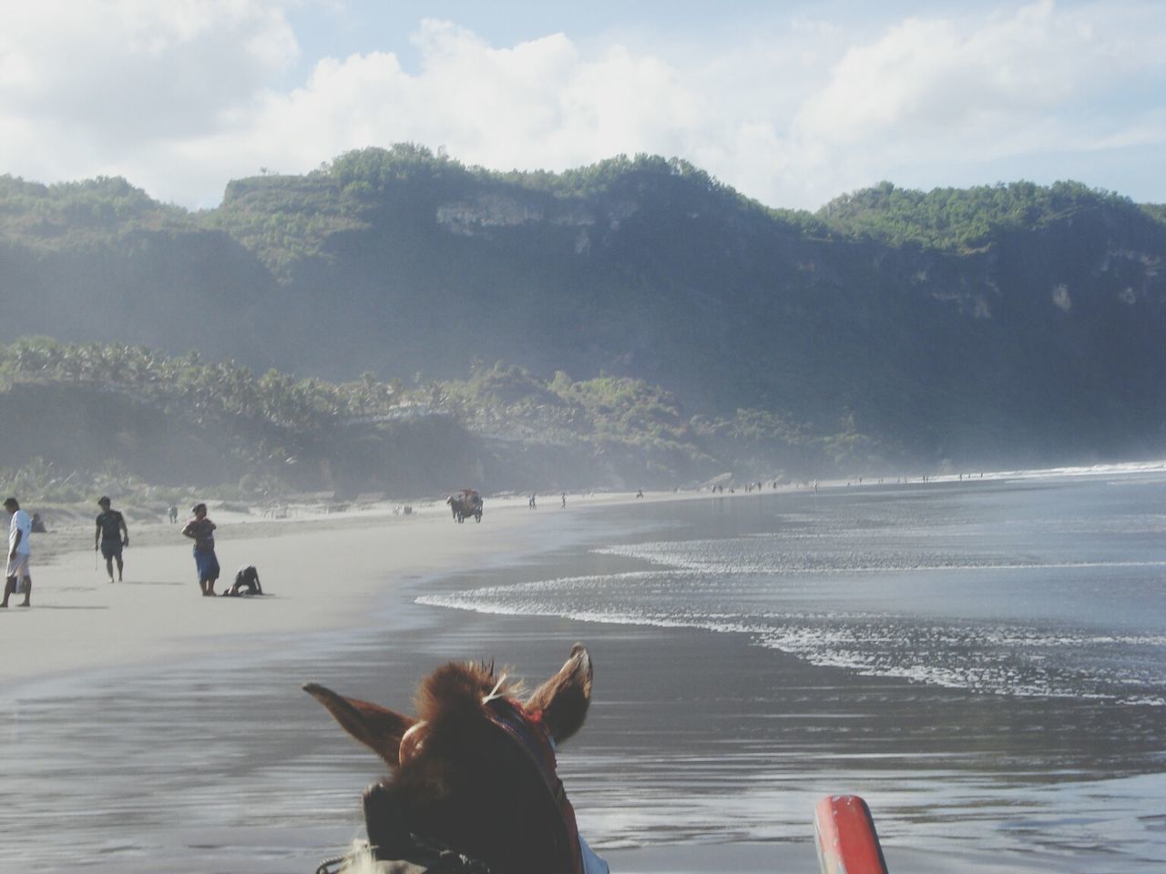 water, leisure activity, lifestyles, sea, mountain, vacations, scenics, men, sky, beauty in nature, beach, person, tranquil scene, nature, tranquility, tourist, travel, relaxation