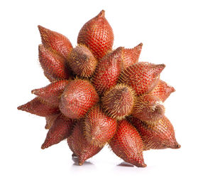 Close-up of strawberry over white background