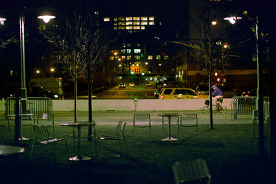 Empty sidewalk cafe at night