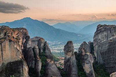 Panoramic view of rock formations against sky during sunset