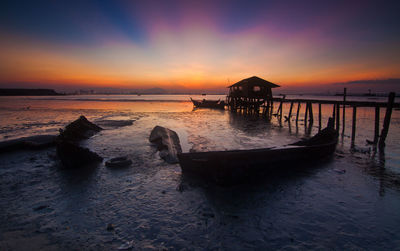 Scenic view of beach during sunset