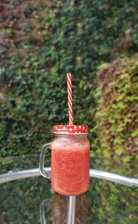 Close-up of drink with glass against blurred background