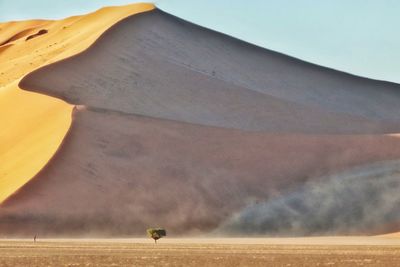 Scenic view of mountain on sunny day at namib desert