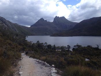 Scenic view of lake and mountains against sky