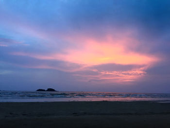 Scenic view of sea against sky at sunset