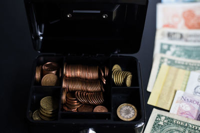 High angle view of coins on table