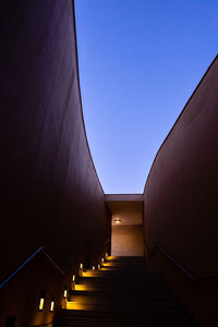 Low angle view of staircase against clear sky