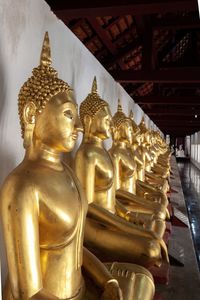 Sculpture of buddha statue outside temple