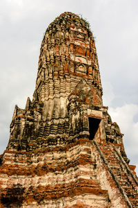 Low angle view of old building in ayutthaya province under the blue sky