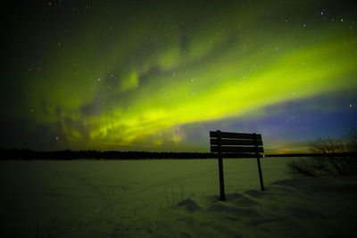 Scenic view of landscape against sky at night