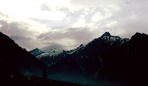 Scenic view of silhouette mountain against sky