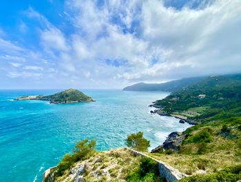 Scenic view of bay against sky