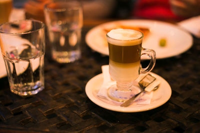 Close-up of coffee cup on table