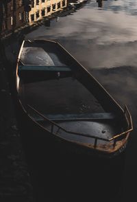 High angle view of wet car by sea against sky