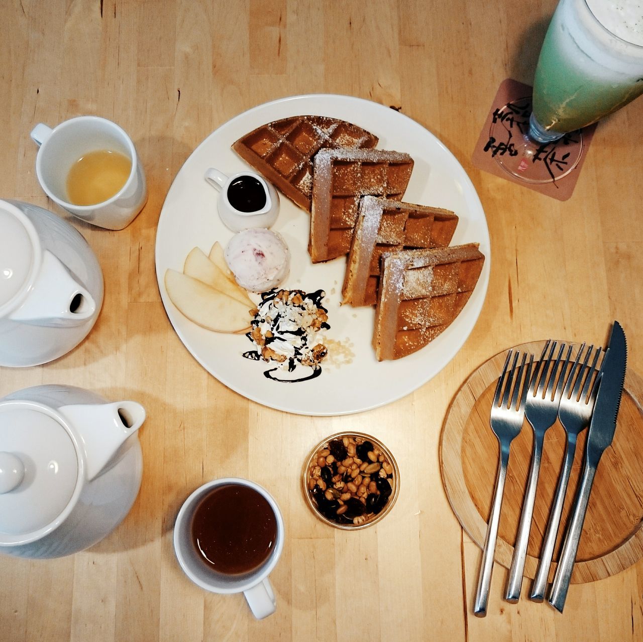 indoors, table, food and drink, drink, plate, still life, high angle view, coffee cup, spoon, fork, refreshment, food, freshness, coffee - drink, cup, saucer, table knife, directly above, bowl, chair