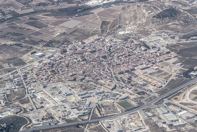 High angle view of road amidst buildings in city